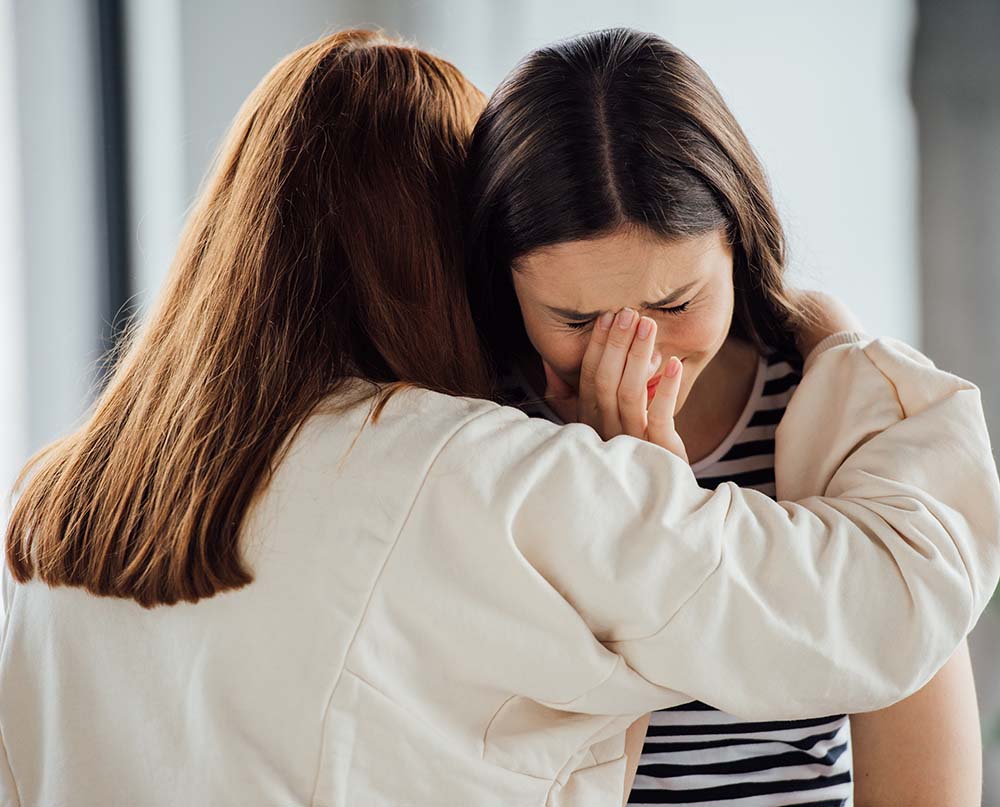 teen-girl-supporting-sad-crying